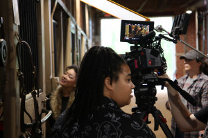 Film students, professionals, Stephens College faculty, and mentors film a scene with talent during the 2024 Summer Film Institute.